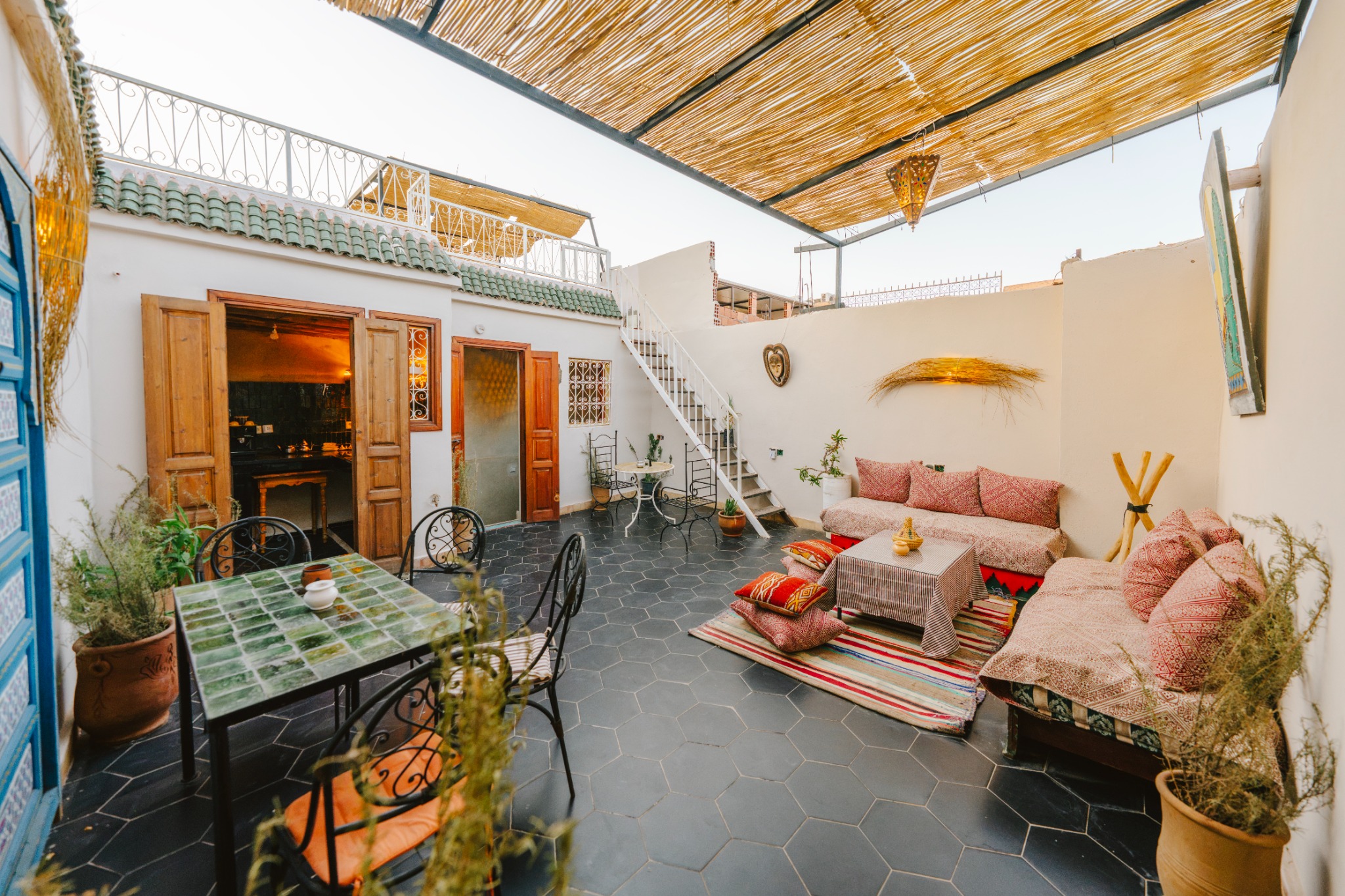 A wide view across the bright riad courtyard